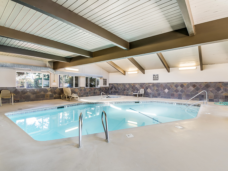 Indoor pool with lounge chairs