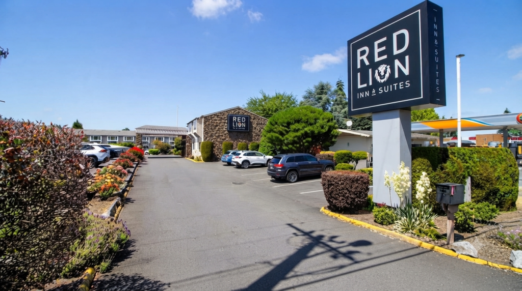 Hotel sign and parking